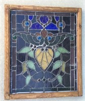 Vintage stained glass panel in wood frame