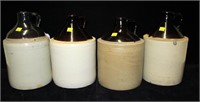 4- Stoneware jugs, approximately 1 gallon each