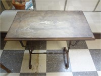 ANTIQUE WOODEN TOPPED WROUGHT IRON TABLE