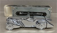 Silver Duesenberg aftershave Avon bottle with
