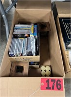 Box of CD's, lantern, & candles