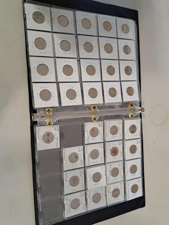 Binder of quarters (70 coins)
