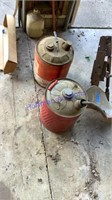 2 - 5 gal gas cans partial full