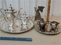 Silver plate serving pieces and Angel candlestick