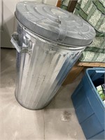 Steel garbage can.