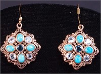 A pair of 10K rose gold earrings