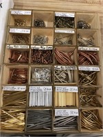 Box of bead necklace making tubes and other