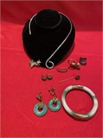 Interesting collection of jewelry. There is a