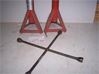 2 jack stands and 4 way lug wrench