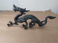 METAL DRAGON STATUE MAGNET DOES NOT STICK TO IT