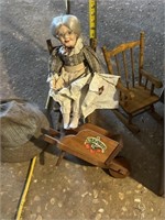 Porcelain Grandma with two wood, rocking chairs