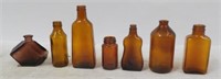 (7) Brown Glass Bottles All Different Shapes and