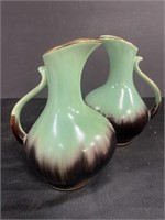 Matching mid-century ceramic pitchers. Made in