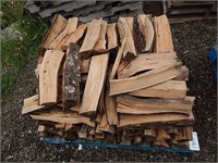 Large pallet of split and dried campfire wood