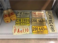 Wooden clogs, metal license plates.