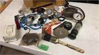 Wire brush, gas caps, gas pump w/gauge, wheels,