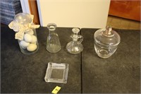 Vintage bottles, vintage jar with eggs, glass dish
