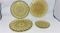 Four amber plates