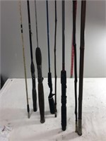 4 fishing poles with extras