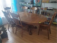 OAK TABLE AND 6 ARROW BACK CHAIRS