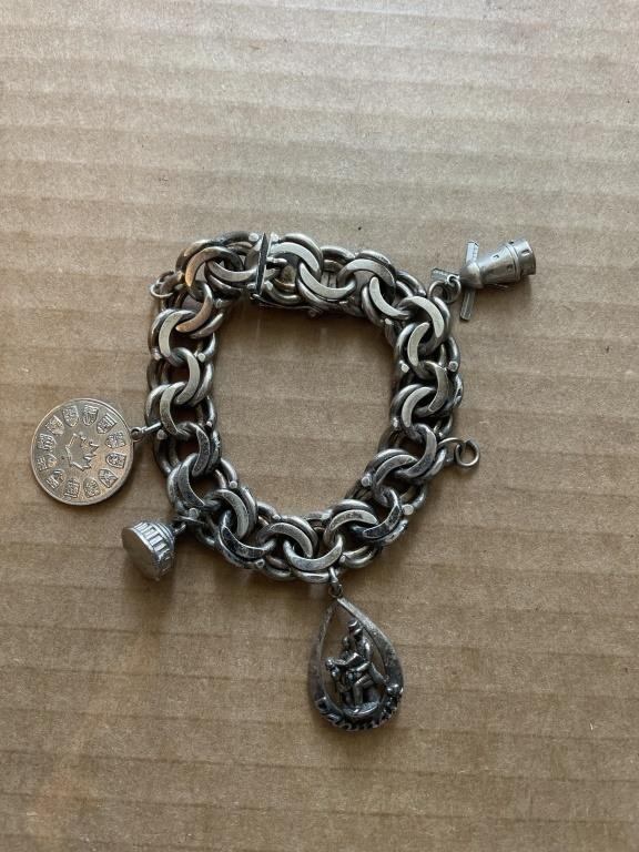 830 S silver bracelet with Charms read description