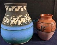 Signed pottery vases