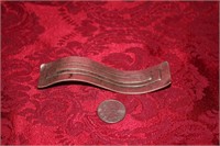 Signed metal plate, 4 1/2" long