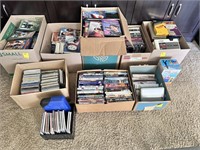(8) Boxes of DVDs , VHSs, CDs