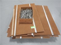 Assorted peg board pieces and hooks; buyer to conf