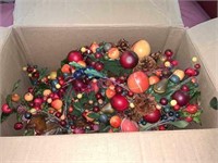 Box of artificial fruit