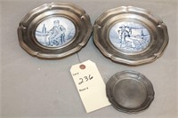 Vintage Delft plates set in pewter, pewter plate