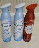 Three cans Febreze air freshener