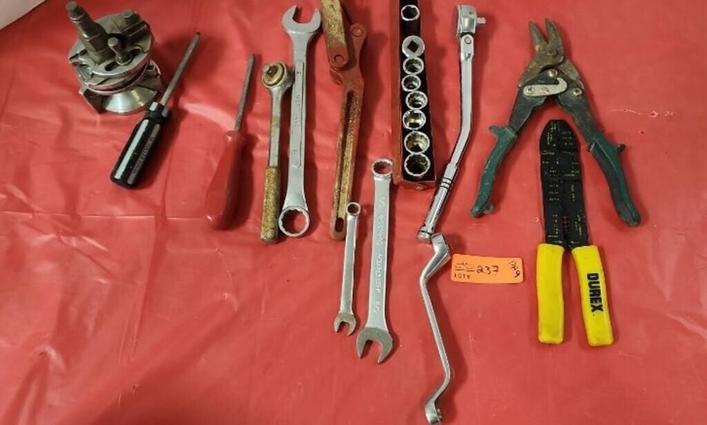 Assorted tools. Wire cutters, wrench, and more.