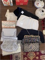 (11) ASSORTED CLUTCH HAND BAGS