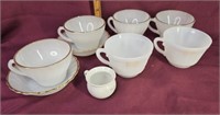 Milk glass cups and saucers