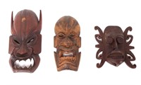 Group of Tibetan and Dayak Wood Carved Masks