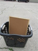 Black Laundry Basket and Cork Board