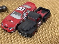 2 1:64 Scale cars