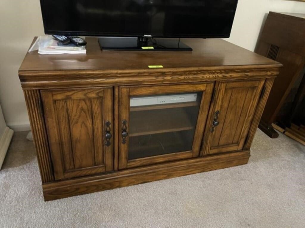 Wooden tv stand with 3 cabinets and glass display