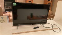 Approximately 32 inch Roku TV with remote