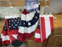 US flag and decorative porch banister flags
