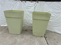 2 green plastic planters