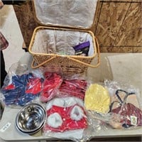 Small dog clothes & toys in picnic baskets