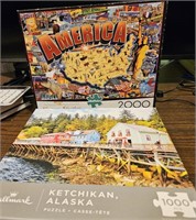 2 puzzles - a 1000 piece by Hallmark and a 2000