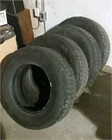 Four Firestone 235/70R/16 Tires
