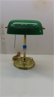 green and brass colored table lamp