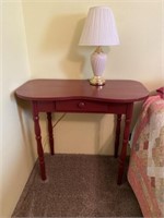 Primitive red writing desk and lamp