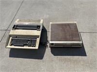 Vintage Sears video disc player and typewriter