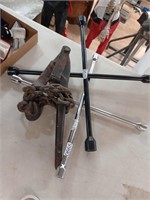 Chain binder and four-way wrenches