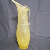 Hand blown glass pitcher